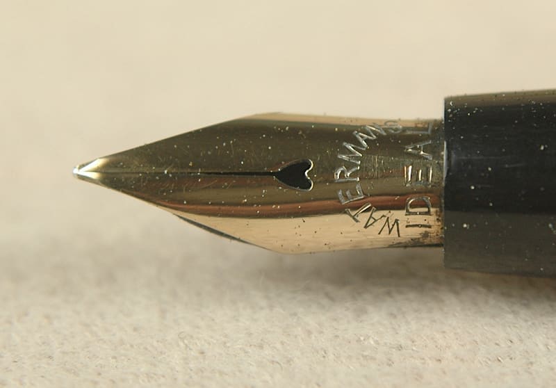 Fountain pen nib close-up detail.