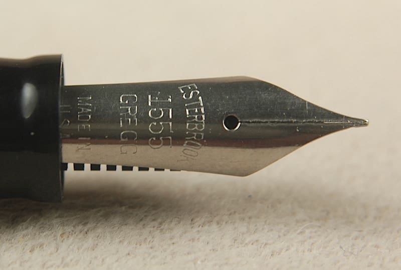 Fountain pen nib with engraved text.
