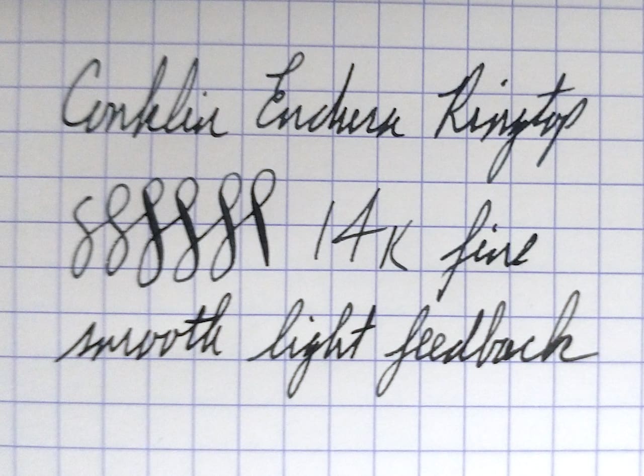 Handwritten text on grid paper.
