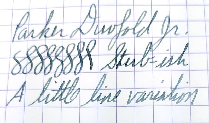 Close-up of handwritten cursive text on lined paper.