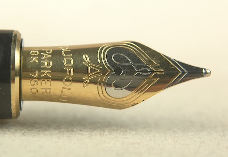 Close-up of a Parker fountain pen nib with intricate engravings.
