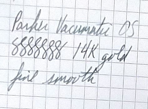 Handwritten text describing jewelry details on graph paper.
