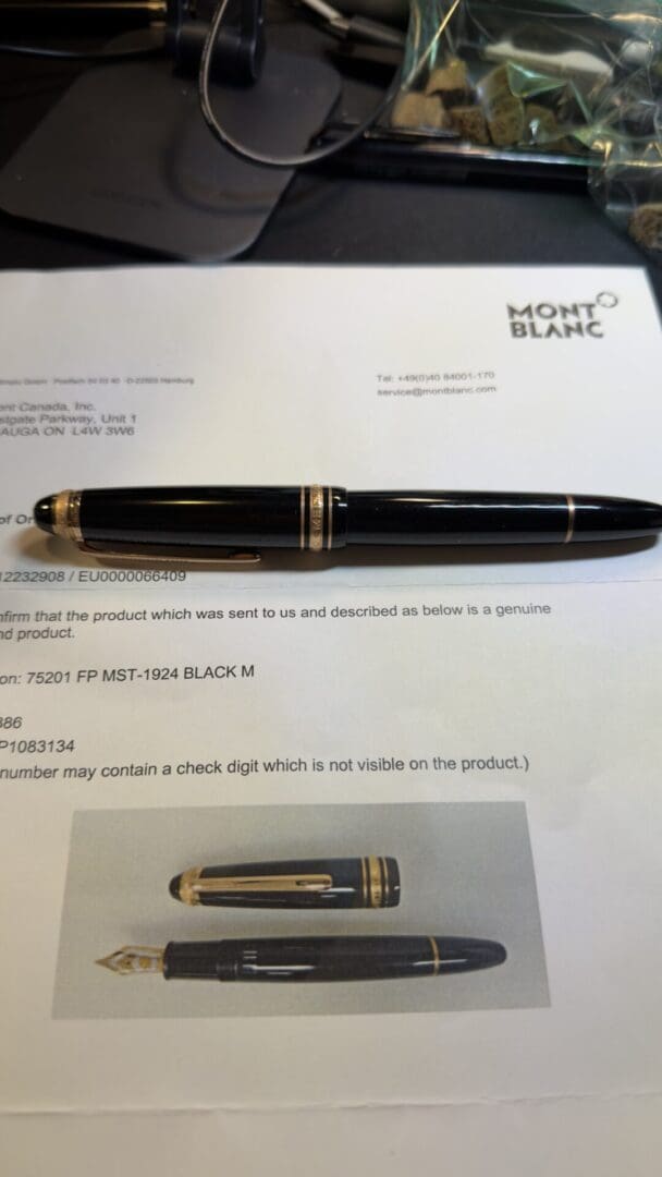 Montblanc Meisterstück pen with its cap on a letter.