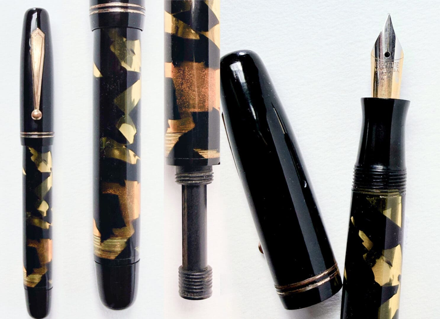 Close-up of a stylish black and gold fountain pen with its cap removed.