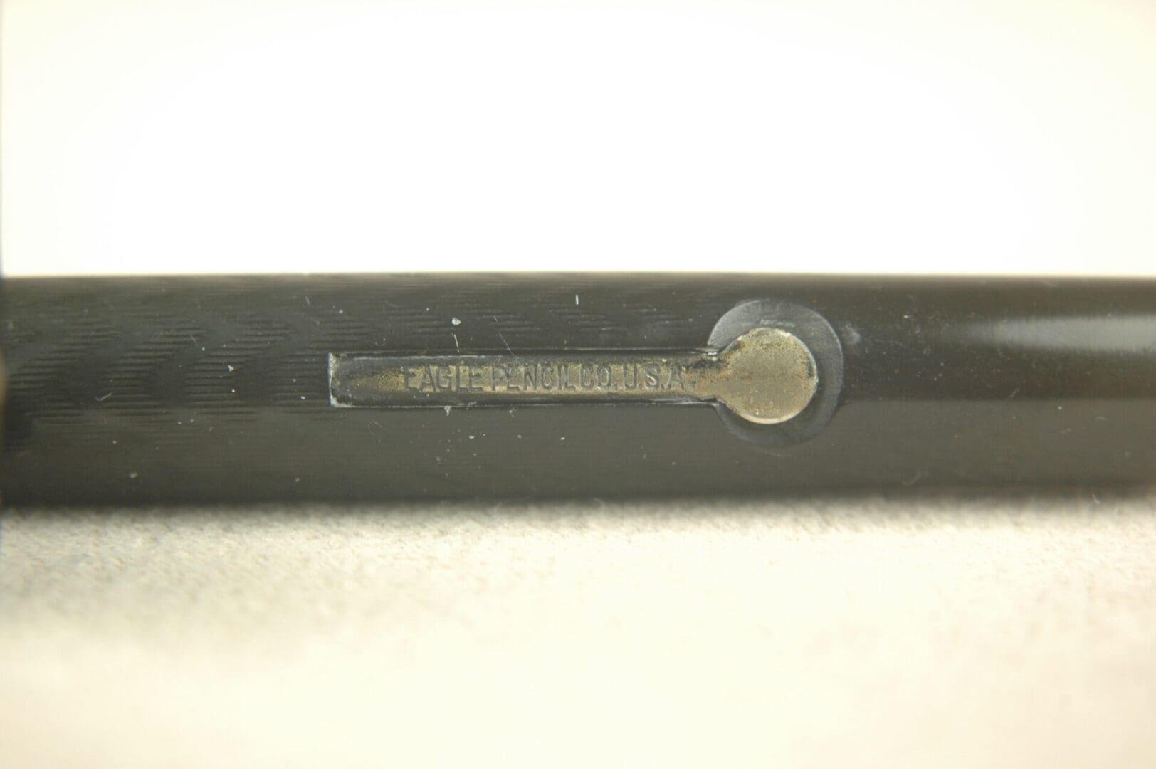 Close-up of a black pen's nib area.