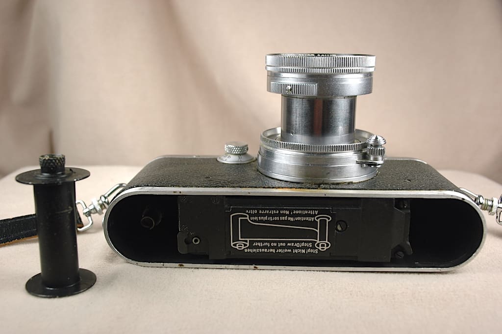 Vintage camera with engraved details on the bottom plate.