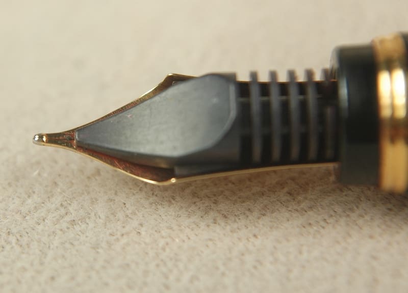 Close-up of a fountain pen nib showing intricate details.