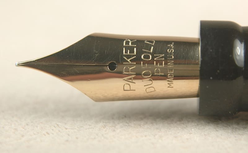 Close-up of a Parker Duofold fountain pen nib.